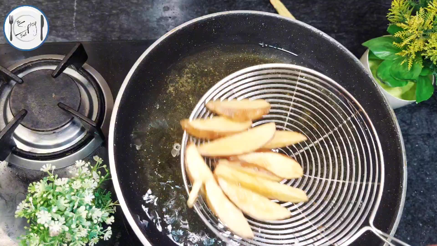 6th step of Crispy Potato Wedges Recipe By The Spi