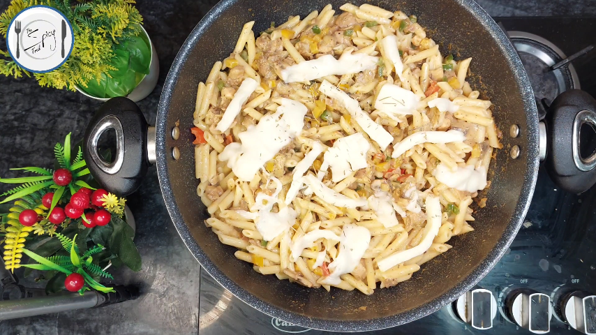 10th step of Chicken Peri Peri Pasta Recipe By The Spicy Trail Chicken Peri Peri Cheese Pasta Recipe