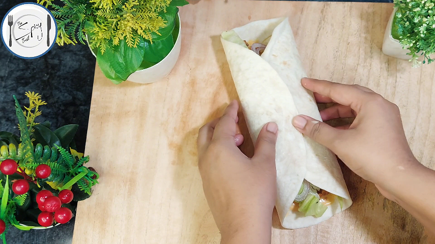 6th step of Tortilla Wrap Recipe By The Spicy Trail Crispy Chicken Wrap Chicken Tender Wrap Crunch Wrap