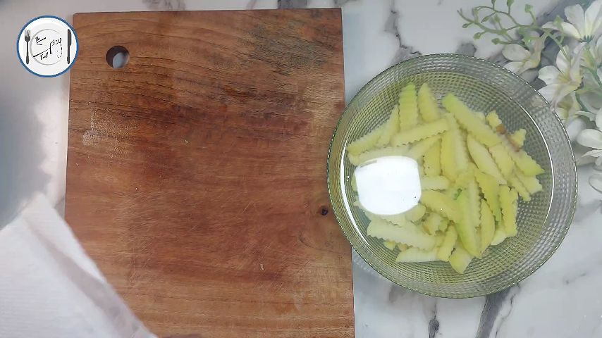 3rd step of Homemade Crinkle Cut French Fries Recipe By The Spicy Trail Frozen French Fries